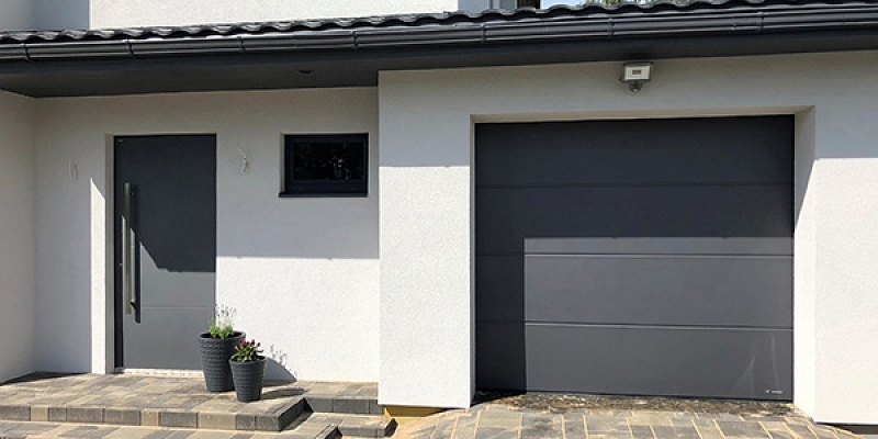 Wisniowski garage doors in the same style as house doors