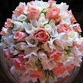 A bouquet of roses and freesias