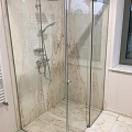 Glazed shower enclosures