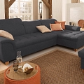 Pull-out corner sofa with adjustable headrests