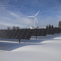 Assembly of solar panels and wind generators