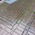 High-pressure washing of pavement
